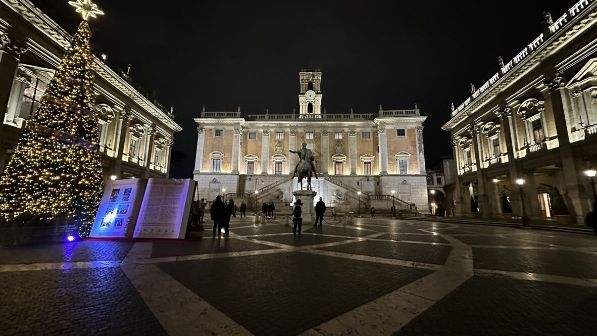 Piazza del Campidoglio lit up at night with a Christmas tree