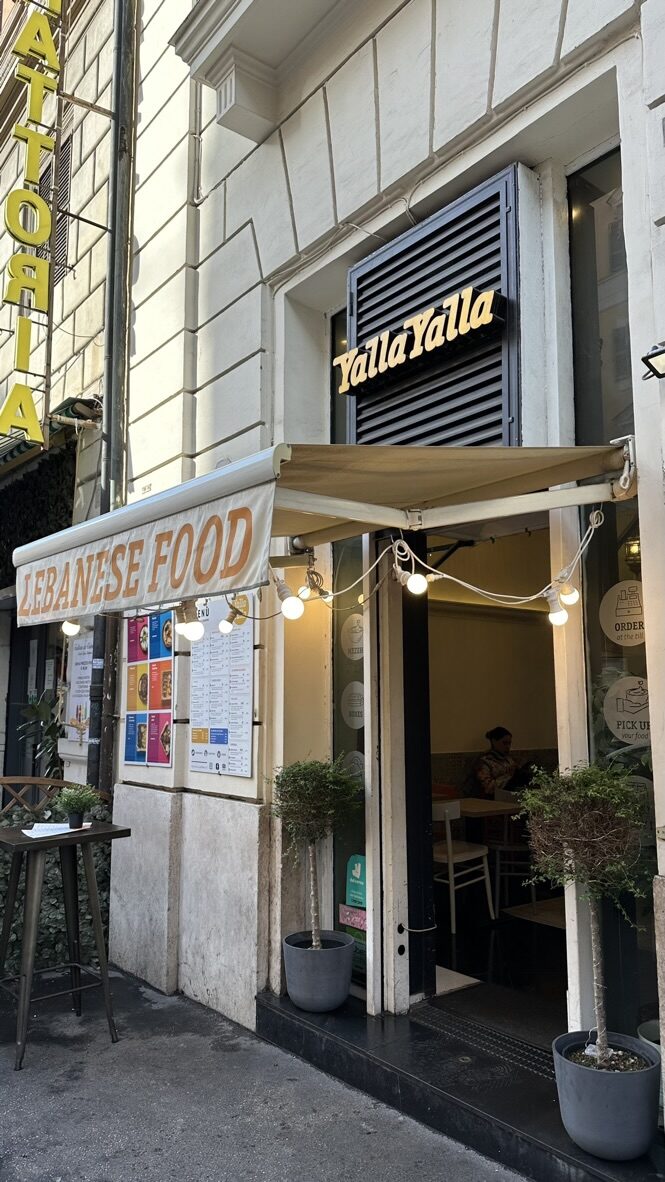 The entrance of Yala Yala restaurant on a Rome street